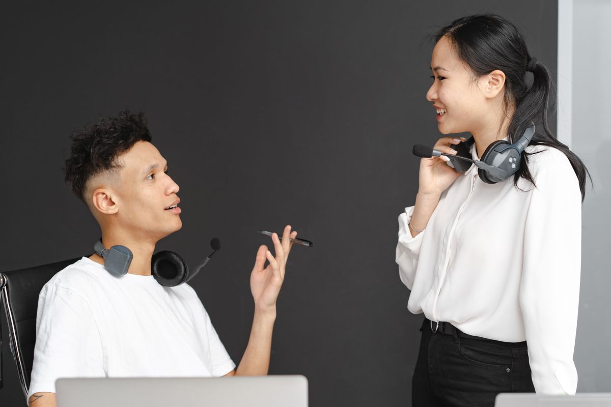 Colleagues working together at a computer